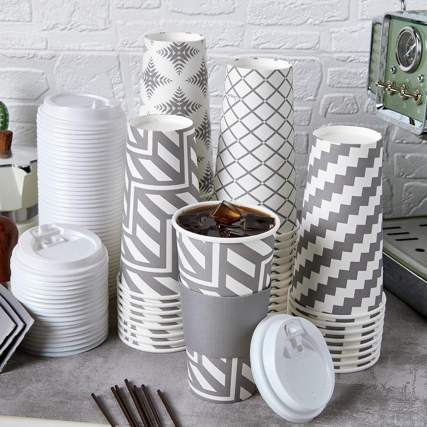 LITOPAK 100 Pack 20 oz Paper Coffee Cups with Lid, Sleeve, and Straws, Four Designs of Disposable Hot Coffee Cups for Home, Stores, and Cafes